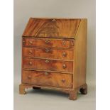 A walnut bureau, with drop down front and four drawers