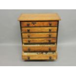 A Victorian pitch pine six drawer butterfly collection, top glazed with written paper labels, 38.