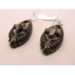 A pair of Victorian Whitby jet pendant earrings, carved and faceted design with gadrooned edge