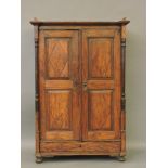 An 18th century Austrian pitch pine wardrobe, with twin panel doors, over single drawer, 127cm