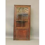 A Georgian mahogany floor standing corner cabinet, 184cm high, and a 19th century mahogany