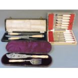 Boxed Victorian silver fish servers, with ivory handle, a boxed Victorian carving set with silver