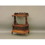 A Victorian walnut Canterbury, with single drawer and fretwork gallery, 63cm wide, 91.5cm high