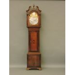 A 19th century longcase clock, the inlaid oak case with arched brass dial, inscribed 'Tempus Fugit',