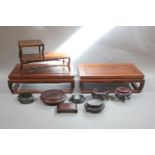 A pair of Chinese hardwood rectangular stands, each 34cm wide, together with a collection of