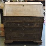 An 18th century oak bureau, with stepped interior, well and ogee feet, 90cm wide, 53cm deep, 98cm