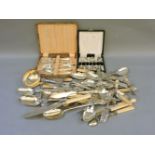 Two late 19th century canteens of fish knives and forks, plated teaspoons, serving spoons, fish