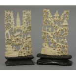 Two mid 19th century Canton ivory small screens, each with a boat below a mountain, with figures,