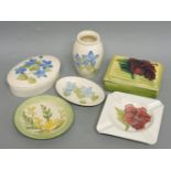 Three Moorcroft items, with blue flowers, a vase, an oval dish and an oval dish and cover, a