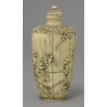 An ivory snuff bottle, circa 1700, the oval section tapering body carved with an archer aiming at