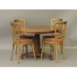 A Regency mahogany breakfast table, with a circular top above an octagonal column, 103cm diameter,