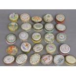 A collection of twenty-four enamel boxes, mostly by Halcyon Days, including Love, Verses, etc, and