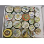 Twenty-two Halcyon Days and Crummles enamel boxes, printed and painted with animals
