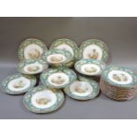 An English bone china dessert service, pattern number 4/2451, each piece painted with a figure in an