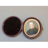 English School, 1850PORTRAIT OF A GENTLEMANOval miniature, in a leather case, embossed Mayall, 433