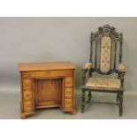 A Victorian carved oak hall chair, with lion cresting, and an oak desk, converted