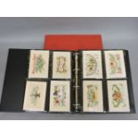 A collection of approximately eighty-six silk cards, WWI and later, including eight woven, mostly