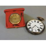 A late 19th century Goliath type pocket/travel clock, with enamel dial and subsidiary seconds