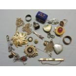 A green guilloché enamel heart locket, a Japanese Satsuma heart shaped brooch, and a collection of