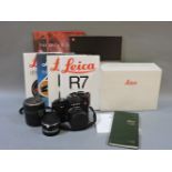 A Leica R7 SLR camera, manuals and booklets