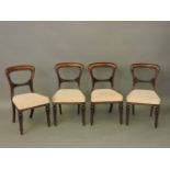 A set of four Victorian walnut dining chairs