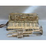 A silver plated trumpet, by T Reynolds and Sons, and a piano accordion 'La Divina'