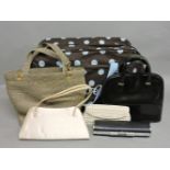 A brown and blue spotted travel bag, and four evening handbags, including a black lizard skin