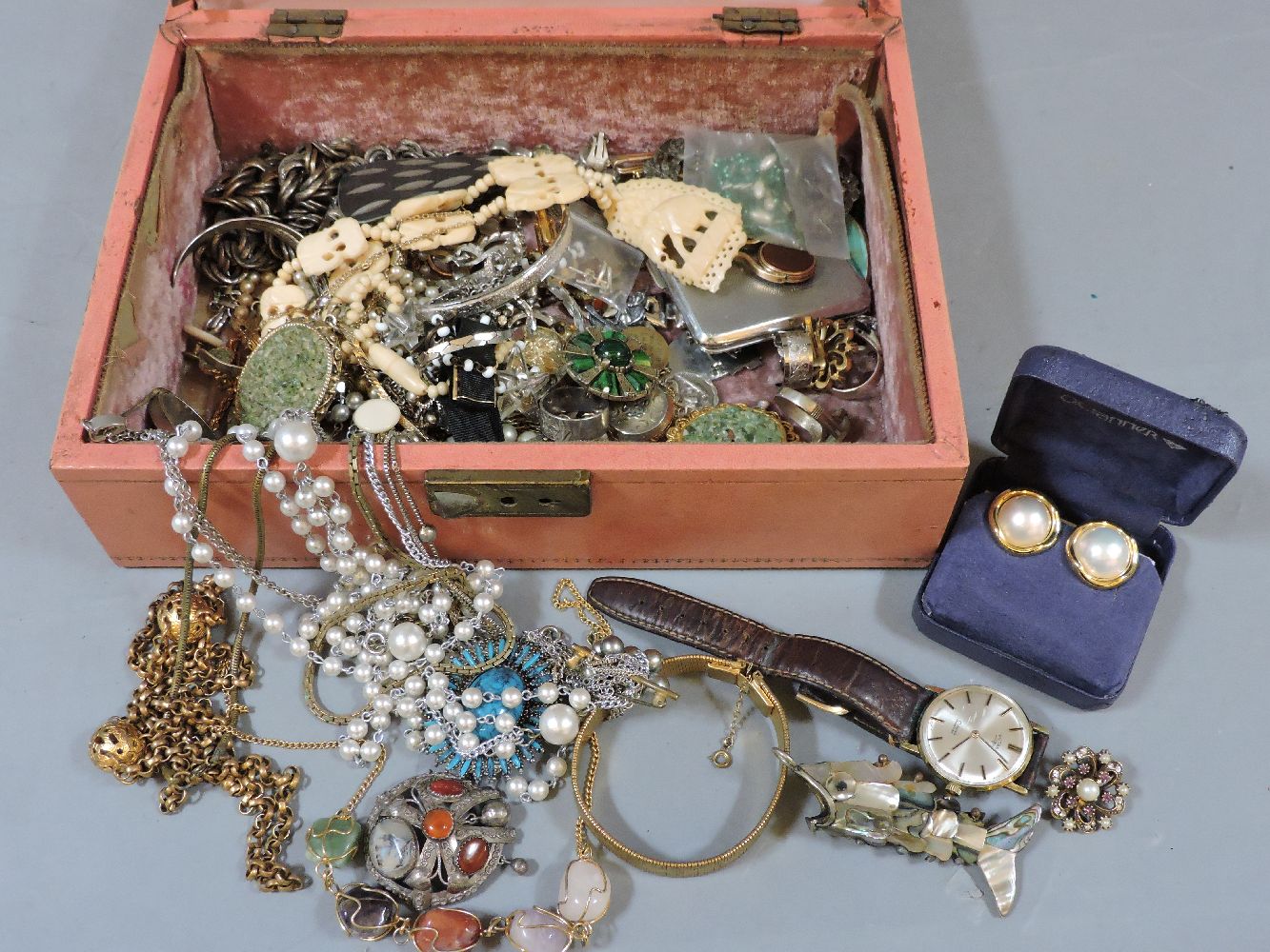 A jewellery box and contents, including a gold swivel fob, silver rings, etc