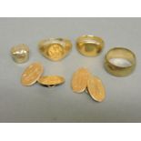 A 9ct gold wedding ring, two gold signet rings, tested as approximately 18ct gold, a pair of 15ct