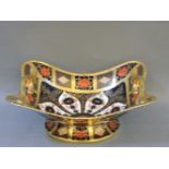 A Royal Crown Derby Imari patterned twin handled rectangular fruit bowl, on footed base, number