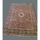 A large red ground rug, 395 x 290cm