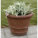 A large terracotta pot, planted, 62cm diameter, 48cm high