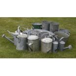 A quantity of galvanised garden watering cans, baths, etc