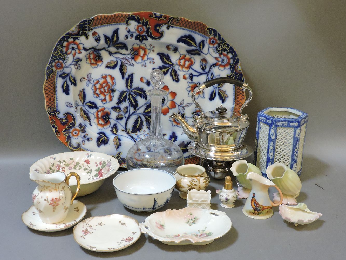 A silver plated spirit kettle, a glass decanter, a Victorian meat plate in Imari pattern, a pair