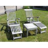 A pair of hardwood garden steamer chairs, with cushions, and a small square table