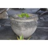 A pair of reconstituted stone planters after Jekyll, with scrolling handles to the sides, each