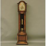 A mid 20th century Winterhalder & Hofmeier oak case long cased clock, the three train movement
