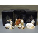 Four various Royal Crown Derby porcelain paperweights, from The Heraldic Beast Collection, to