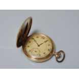 A Swiss full hunter gold pocket watch, with sun ray engine turned decoration to both covers,