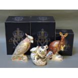 Three various Royal Crown Derby porcelain paperweights, to include Cockatoo, Kangaroo, and Koala and