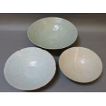 Three dishes, reproductions, one a Northern celadon, one Qingbai engraved with lotus, the third