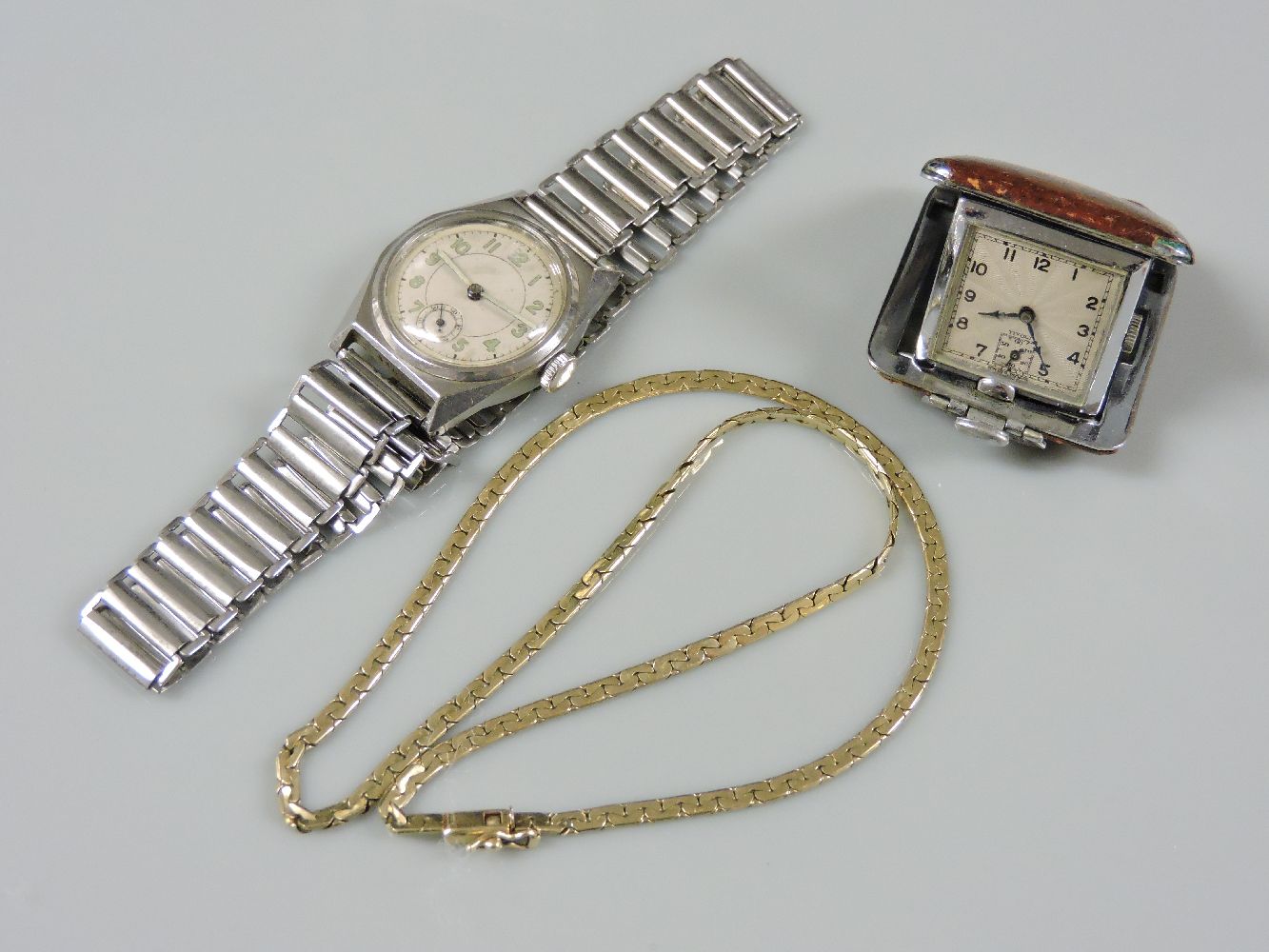 A ladies 9ct gold rolled box link chain, a stainless steel gentleman's mechanical strap watch with