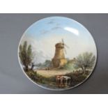 A Minton pottery plate, painted by Amhardi of Old Mill at Kempsford, Gloucestershire, 25.5cm