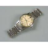 A gentleman's stainless steel Omega Seamaster mechanical bracelet watch, with raised silver baton