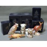 Five various Royal Crown Derby porcelain paperweights, to include Duck Billed Platypus, Queensland