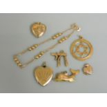 A 9ct gold heart shaped locket, a 9ct gold bracelet with rows of beads, a 9ct gold dolphin