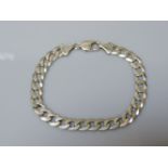 A 9ct gold filed curb link bracelet, 26.36g