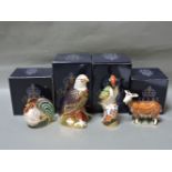 Four various Royal Crown Derby porcelain paperweights, to include Bald Eagle 264/300, Nanny Goat,