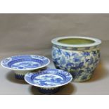 A modern blue and white Chinese fish bowl, and two blue and white Willow pattern comports