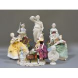A pair of 19th century porcelain figures, three Royal Doulton figures, a parian figure and bust, and